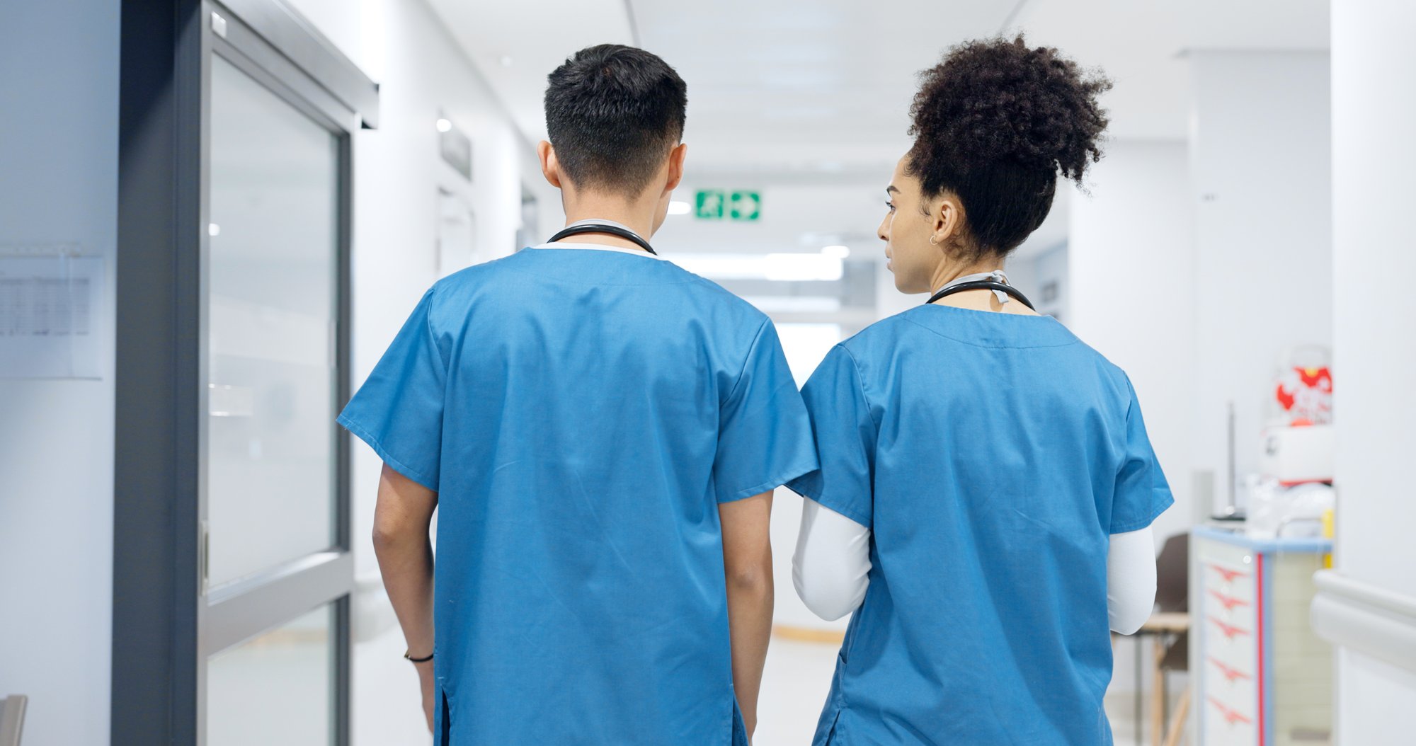 healthcare-professionals-walking-in-hospital-corri-2026-03-25-02-17-44-utc